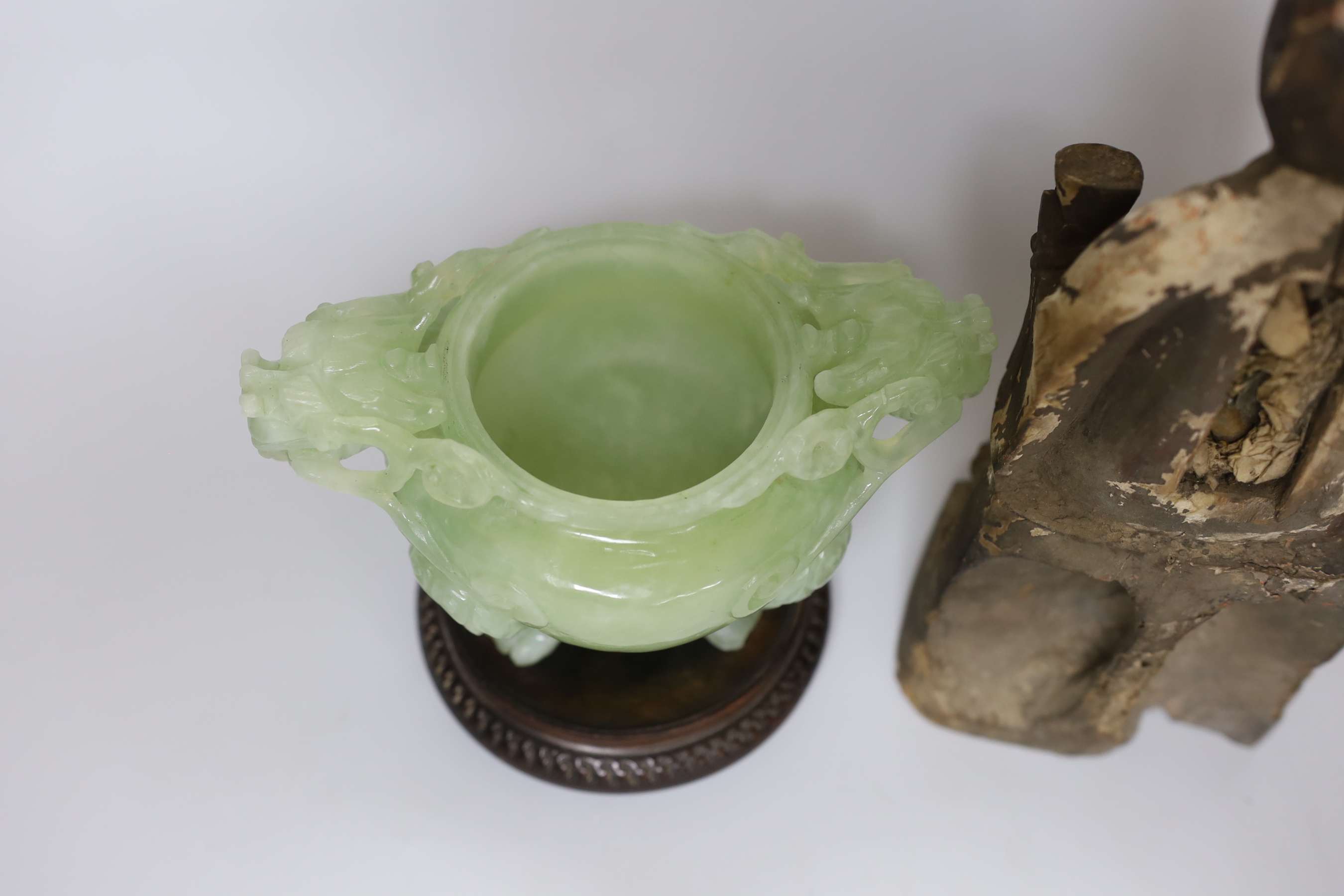 A Chinese bowenite jade censer, on stand and Chinese Qing carved and lacquered wood figure of a seated deity, 24cm
